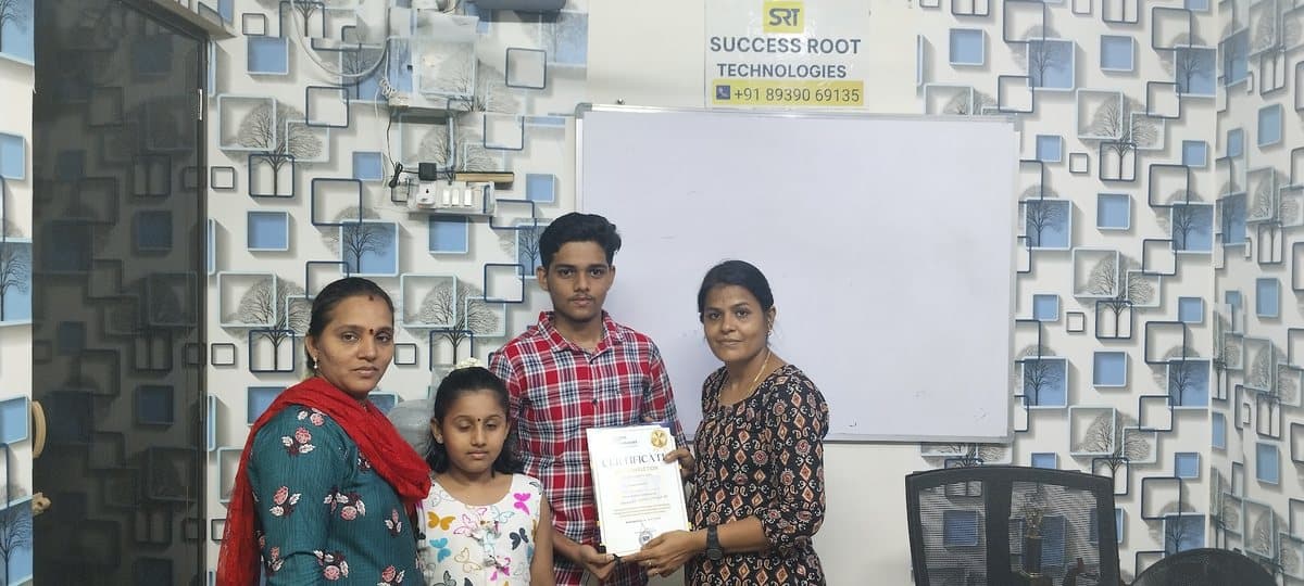 Student and family at a Success Root Technologies certificate presentation